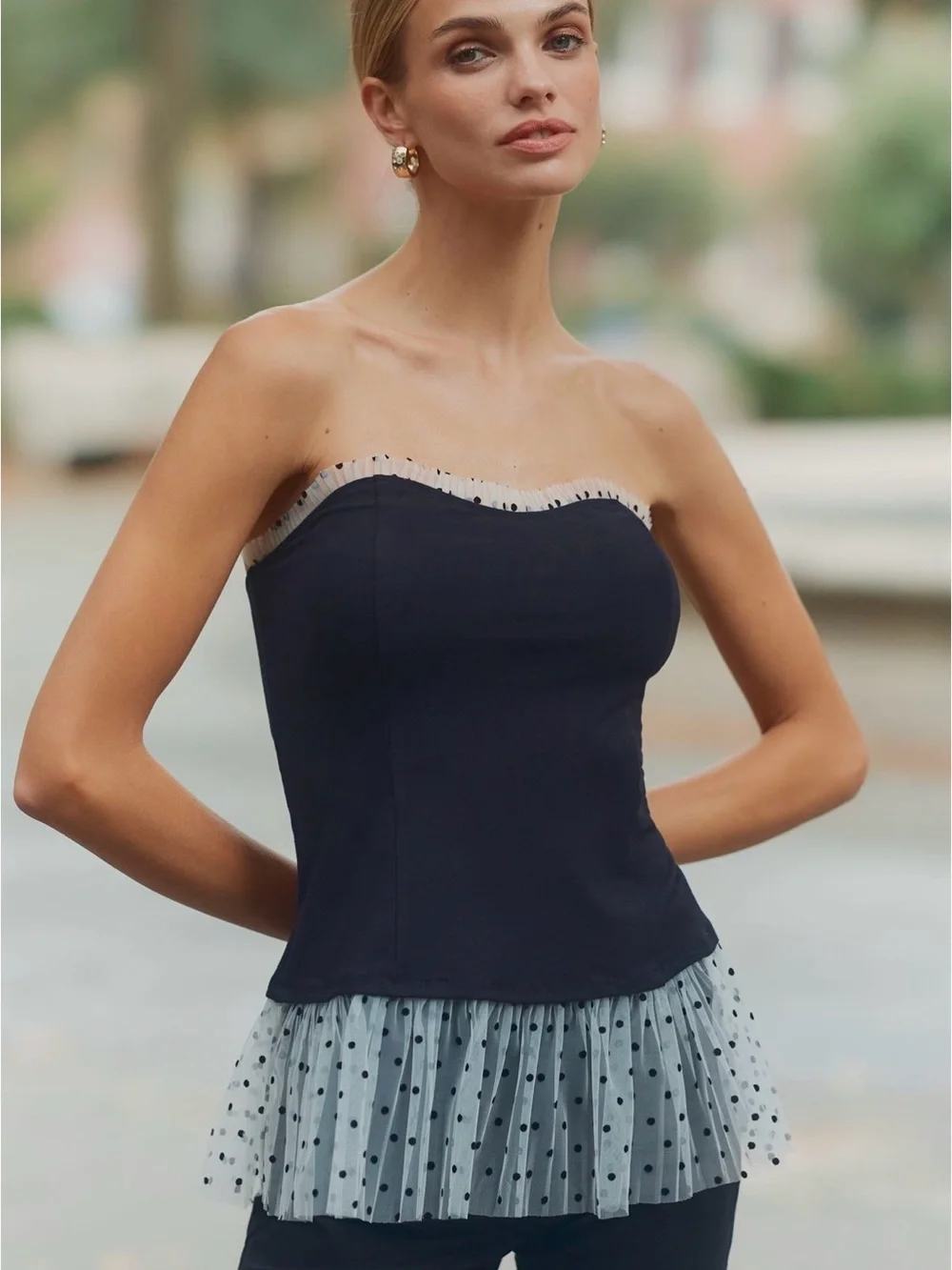 Maeve Navy Strapless Peplum Top with Sheer Polka-Dot Trim - Picture 1 of 4